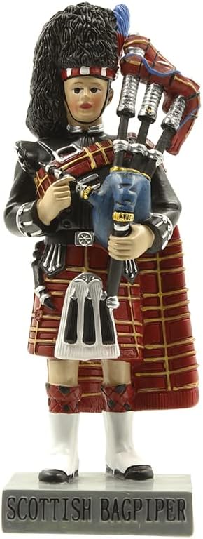 RESIN FIGURE OF SCOTLAND BAG PIPER